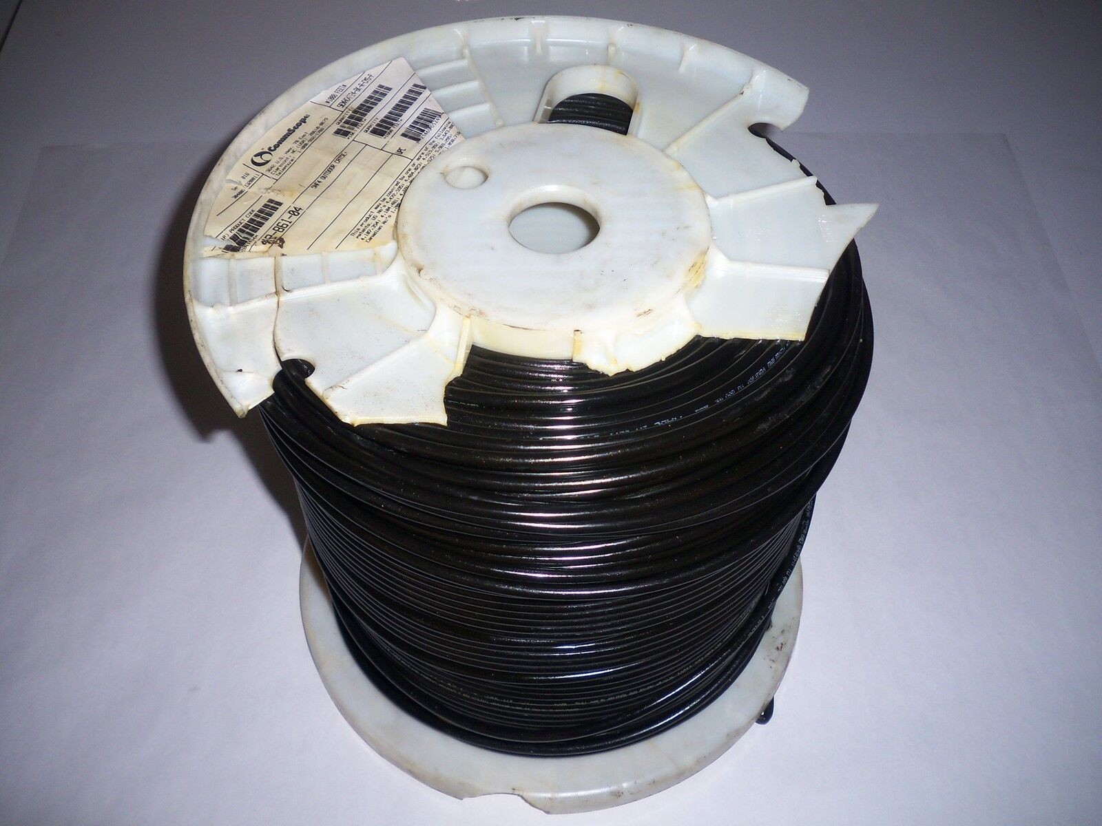 CommScope 1,000' Cat5e Black Outdoor Burial UV Flooded 350Mhz 5NF4 DAMAGED SPOOL