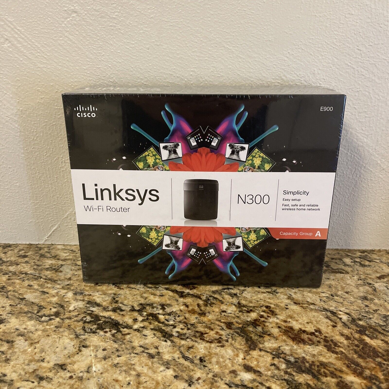 Linksys E900 300 Mbps 4-Port 10/100 Wireless N Router (E900-NP)