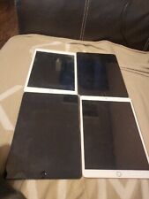 Four Ipads air unlocked, A2153 for parts  picture