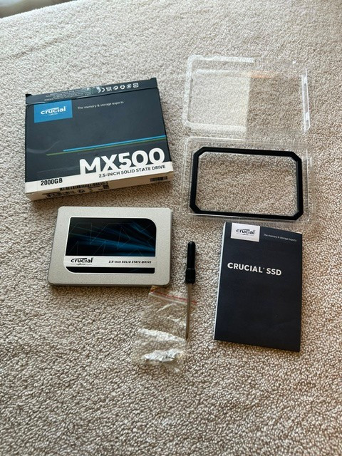 Crucial MX500 2TB SATA III 2.5 in SSD, New open box. SEE Screenshots. .